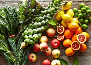 a group of fruits and vegetables on a wood surface Healthy Weight Loss Diets Crawley